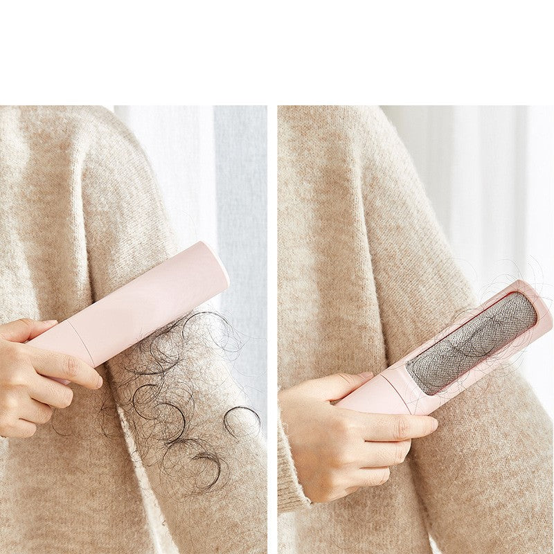 Pink reusable lint remover roller collecting loose hair and lint from a beige sweater.
