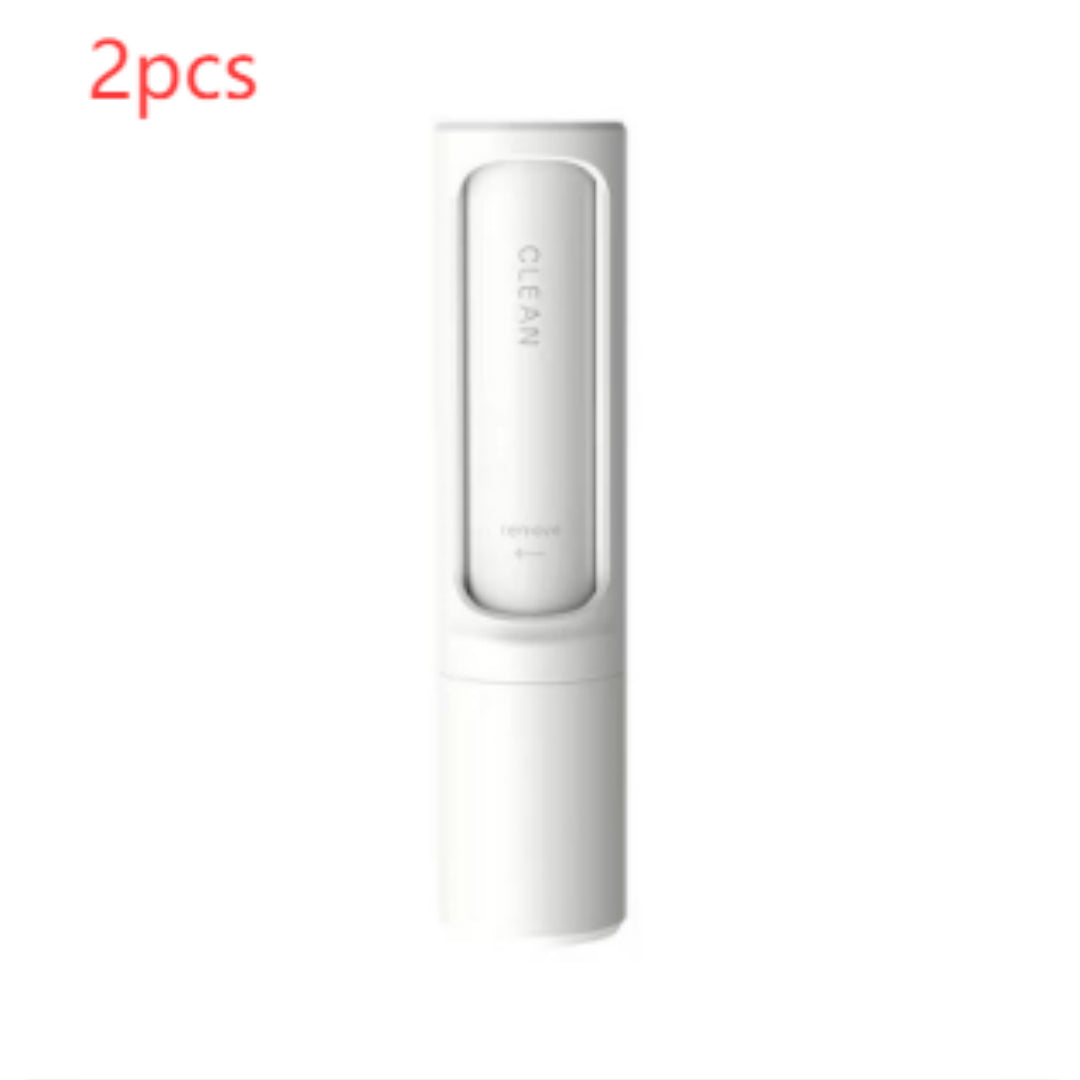 Two white reusable self-cleaning lint and pet hair remover rollers